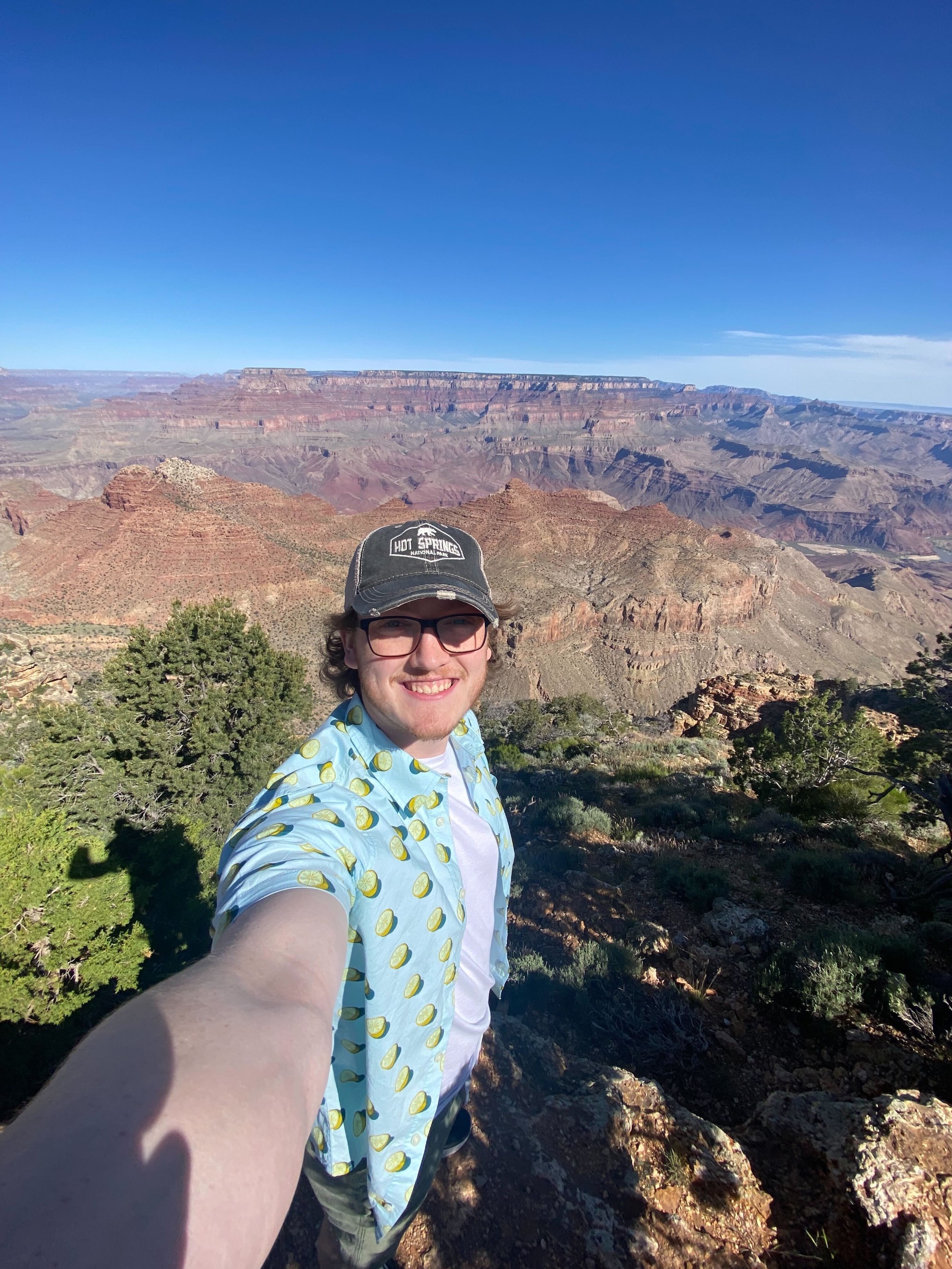 Boy in front of Grand Canyon